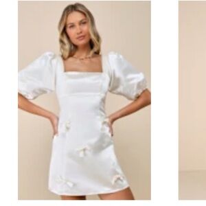 Lovely Simplicity
Champagne Satin
Puff Sleeve Bow
Mini Dress